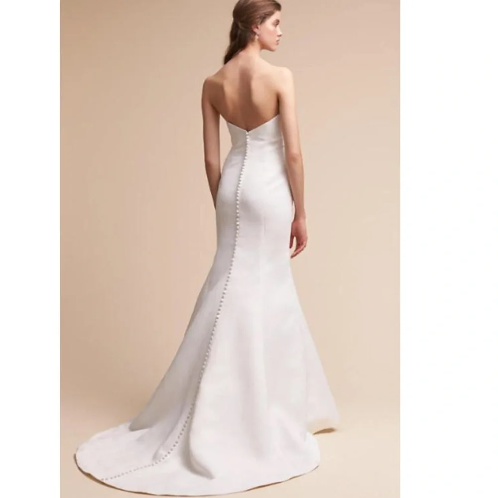 BHLDN Strapless White Mermaid Wedding Gown with Covered Buttons